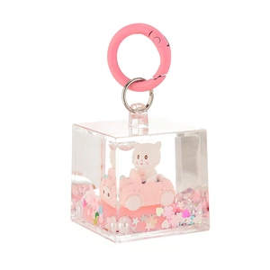 Cartoon cat in pink car liquid quicksand acrylic keychain with pink glitter heart