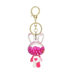 Acrylic rabbit keychain charm with heart pattern and lucky text in pink pearls