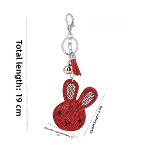Detailed view of red rhinestone rabbit keychain with dimensions 19cm length and 8cm height