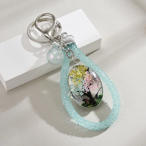 Handmade Tree of Life glass pendant keychain with real dried flowers and blue glitter cord