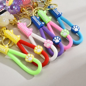 Colorful silicone cartoon lanyards with soft U-shaped handle and 3D cat paw charm detail