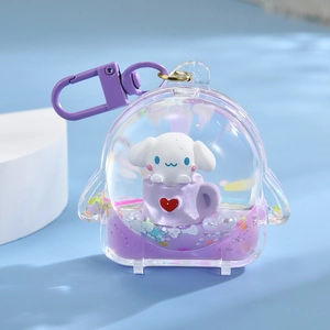 Macro shot of a Cinnamoroll liquid quicksand keychain with purple glitter and charms