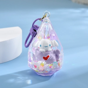 Detail of Cinnamoroll liquid quicksand keychain in purple diamond cut shell with stars