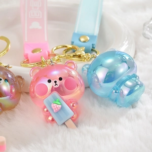 Porte-clés ours mignon en acrylique avec dégradé laser et dragonne colorée assortie