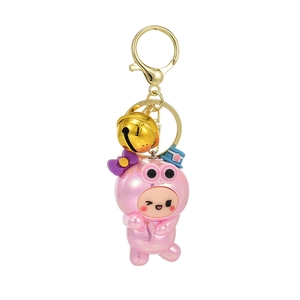 Porte-clés poupée grenouille rose mignon avec cloche dorée et acrylique UV sur fond blanc
