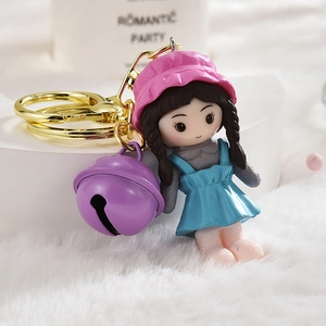 Porte-clés figurine fille mignonne en résine avec grosse cloche violette et fermoir