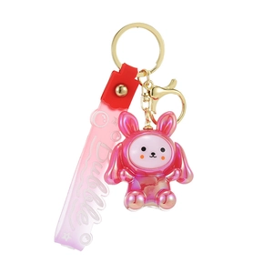 Iridescent bunny keychain with gradient bubble wristband and golden metal lobster clasp