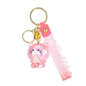 Pink translucent acrylic cat keychain with white ice cream cone and golden bell