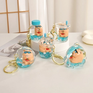 Cute Capybara liquid quicksand keychains with colorful charms and gold metal rings