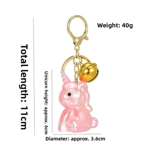 Pink unicorn keychain detail showing 11cm total length and 40g weight dimensions