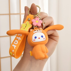 Cute orange rabbit silicone keychain with stress-relief ears and star printed strap
