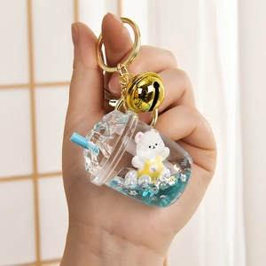 Creative bear floating in liquid mini milk tea cup keychain with blue sand and gold bell
