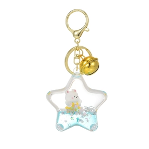 Creative star-shaped floating bear keychain with blue liquid and gold metal bell charm
