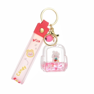Creative rabbit liquid quicksand keychain with pink backpack bottle and strawberry charm