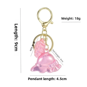 Pink bow hat and grape charm keychain with size measurements and golden lobster clasp