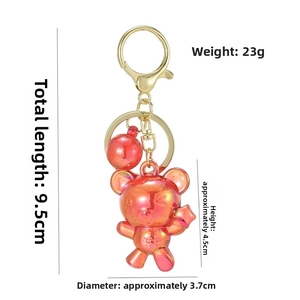 Detailed dimensions of transparent gradient red bear keychain with gold hardware