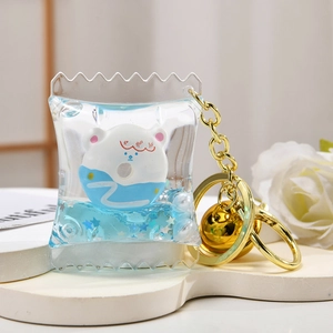 Cute acrylic candy bag keychain with blue liquid quicksand and cartoon bear charm
