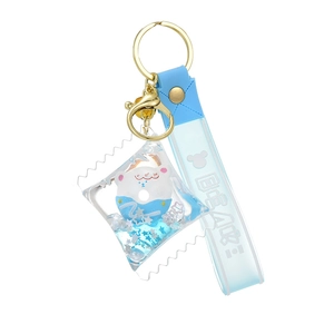 Blue and white liquid quicksand keychain with cute bear donut model and silicone strap