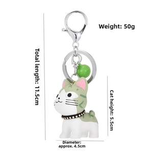 Detailed view of cute resin cat keychain showing 11.5cm length and 50g weight specs