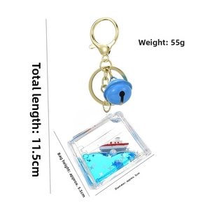 Detail view of sailboat oil keychain with dimensions 11.5cm length and 55g weight