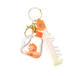 Creative liquid quicksand keychain featuring orange fox doll in a clear bubble bottle
