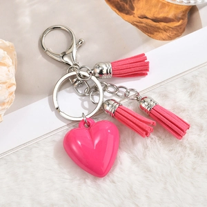 Pink heart pendant keychain with matching velvet tassels and silver lobster clasp