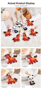 Detailed view of cartoon horse and panda keychains with lucky charms and gold clasps