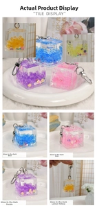 Detailed views of glow-in-the-dark acrylic liquid sand keychains in multiple colors