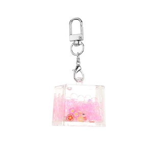 Luminous square acrylic floating liquid keychain with pink sand and flower sequins