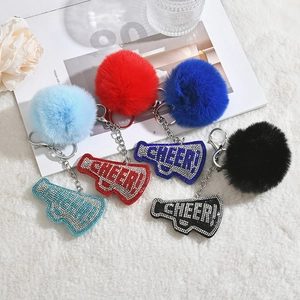CHEER! rhinestone megaphone keychain with large fluffy pompom charms in multiple colors