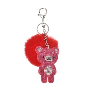 Sparkly bear keychain with pink rhinestones and a large fluffy red pompom charm