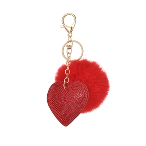 Red heart velvet keychain with sparkling rhinestones and fluffy fur ball on gold ring