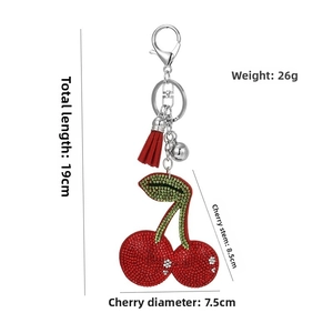 Detailed size view of red rhinestone cherry keychain with tassel and dimensions