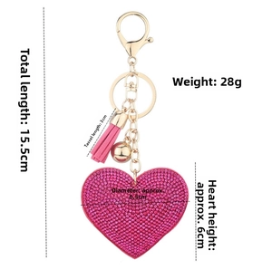 Detailed size specifications of heart rhinestone keychain with tassel and dimensions