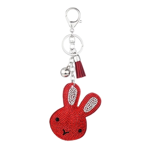 Cute cartoon rabbit keychain with red rhinestones, silver bell and tassel charm