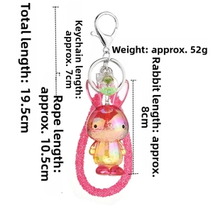 Pink gradient acrylic rabbit keychain with rhinestone rope and silver metal ring detail