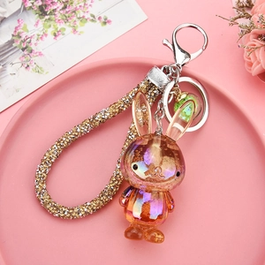 Detail of cute gradient resin rabbit keychain with sparkling rhinestone rope and metal clasp
