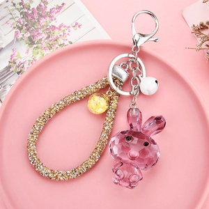 Pink acrylic crystal rabbit keychain with rhinestone strap on elegant pink plate decoration