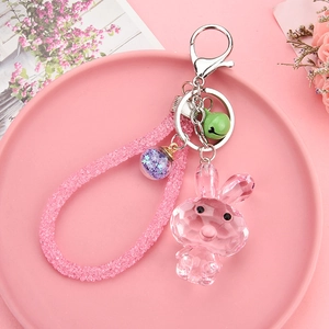 Pink faceted resin bunny keychain with sparkling diamond rope and a purple star charm