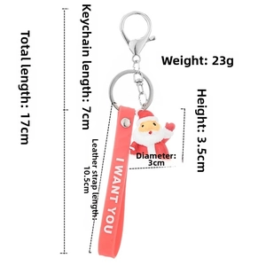 Detailed size chart of Santa Claus keychain with red strap and dimensions in centimeters