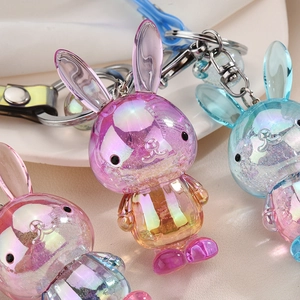 Colorful acrylic bunny keychains with glitter sand and matching faux leather straps