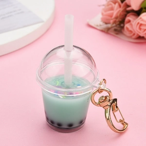 Miniature mint green pearl milk tea keychain with gold moon clasp for bag decoration
