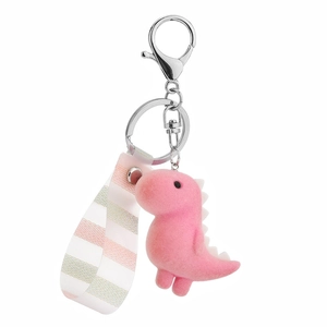 Pink flocked dinosaur keychain with striped strap and metal clasp on white background