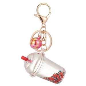 Creative watermelon bubble tea liquid keychain with floating charms and golden lobster clasp