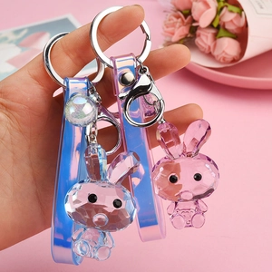 Cute acrylic rabbit keychain with faceted crystal design and colorful laser hand strap