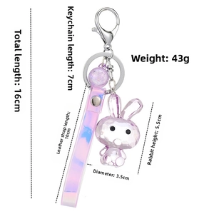 Detail view of purple acrylic rabbit keychain with laser leather strap and silver metal clasp