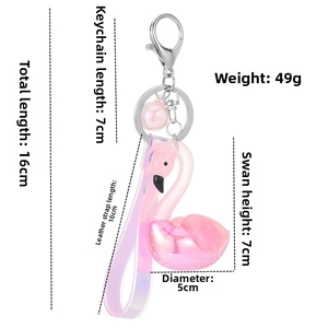 Pink flamingo acrylic keychain with iridescent liquid sand and gradient leather strap