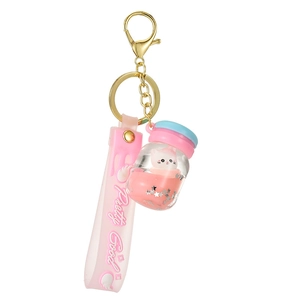 Pink liquid glitter keychain with cute white cat in bottle and Pretty Good strap