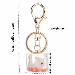 Detailed size specifications for the cute white rabbit acrylic bottle keychain charm
