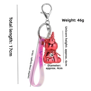 Detailed size chart of red acrylic unicorn keychain with metallic finish and strap